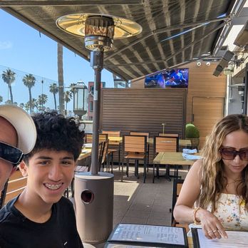 BLK Earth Sea Spirits - Family having fun. - Seafood Near Me - Huntington Beach, California BLK Earth Sea Spirits - Family having fun. - Seafood Near Me - Huntington Beach, California