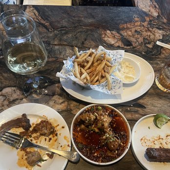 Earls Kitchen + Bar - Korean sticky Ribs, truffle fries, dumplings or what remained before I took the pic! Flavor town no doubt! - New American Near Me - Bellevue, Washington Earls Kitchen + Bar - Korean sticky Ribs, truffle fries, dumplings or what remained before I took the pic! Flavor town no doubt! - New American Near Me - Bellevue, Washington