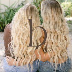 Blush Salon & Co - Blush stylists Carli & Rhianna wearing 22" hand tied extensions.