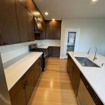 Emerald City Custom Cabinets - After photo 2: Full kitchen transformation with ceiling-height cabinets and updated finishes for a sleek, elevated design. - Cabinetry Near Me - Kent, Washington Emerald City Custom Cabinets - After photo 2: Full kitchen transformation with ceiling-height cabinets and updated finishes for a sleek, elevated design. - Cabinetry Near Me - Kent, Washington