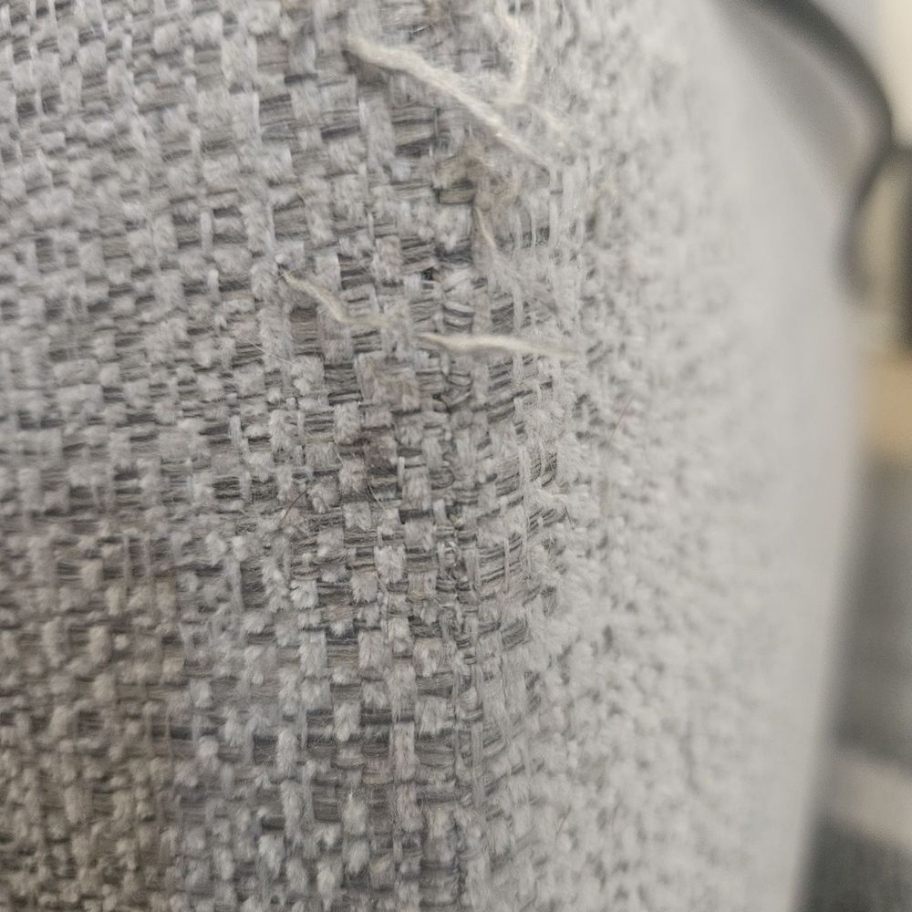 Cat scratches very visible when the associate said this would not happen on this type of fabric. I should have known better.