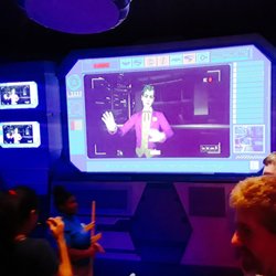 JUSTICE LEAGUE: Battle for Metropolis - The Joker (mark hamill is that you??) taunts guests waiting in line along with Lex Luthor