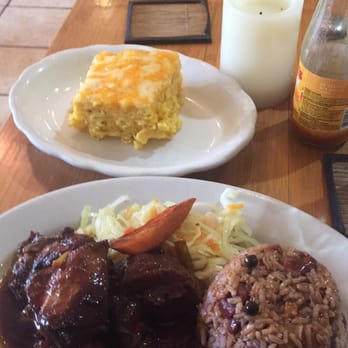 Flames Restaurant II - Rice and peas, stew chicken, cabbage, fried plantains with a side of macaroni pie - Caribbean Near Me - Boston, Massachusetts