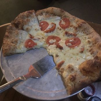 Mellow Mushroom Lincoln - The Great White medium pizza minus two slices. - Pizza Near Me - Lincoln, Nebraska Mellow Mushroom Lincoln - The Great White medium pizza minus two slices. - Pizza Near Me - Lincoln, Nebraska