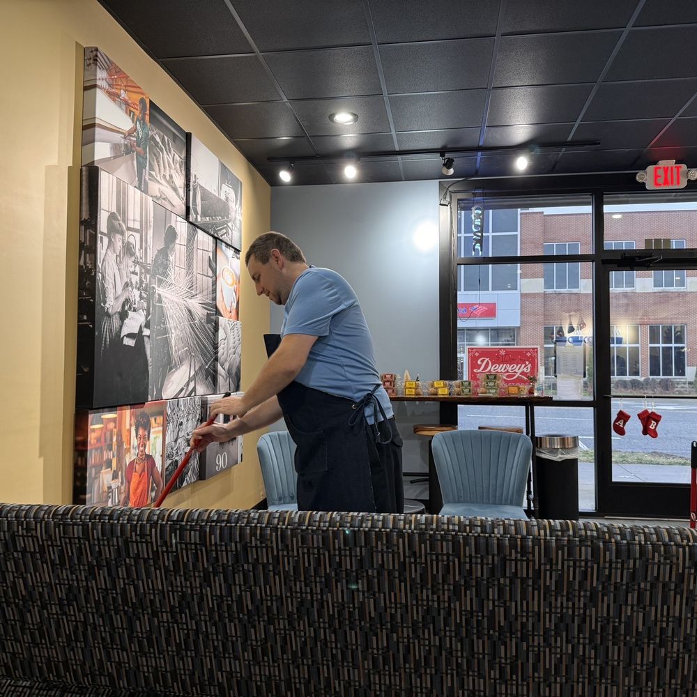 a man moving a couch