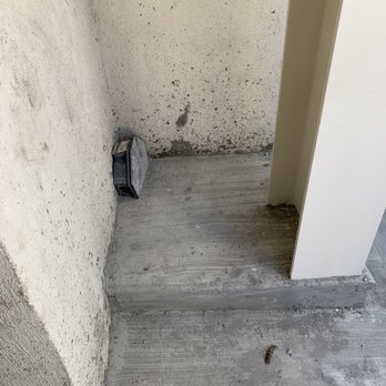 HZS Engineering & Construction - Cement left slopped on the walls - Structural Engineers Near Me - Orange, California