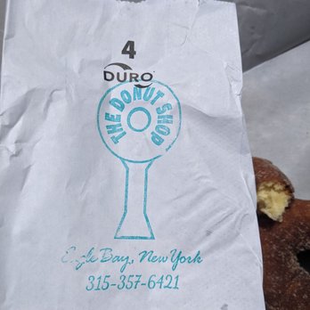 The Donut Shop - Their logo. - Donuts Near Me - Eagle Bay, New York