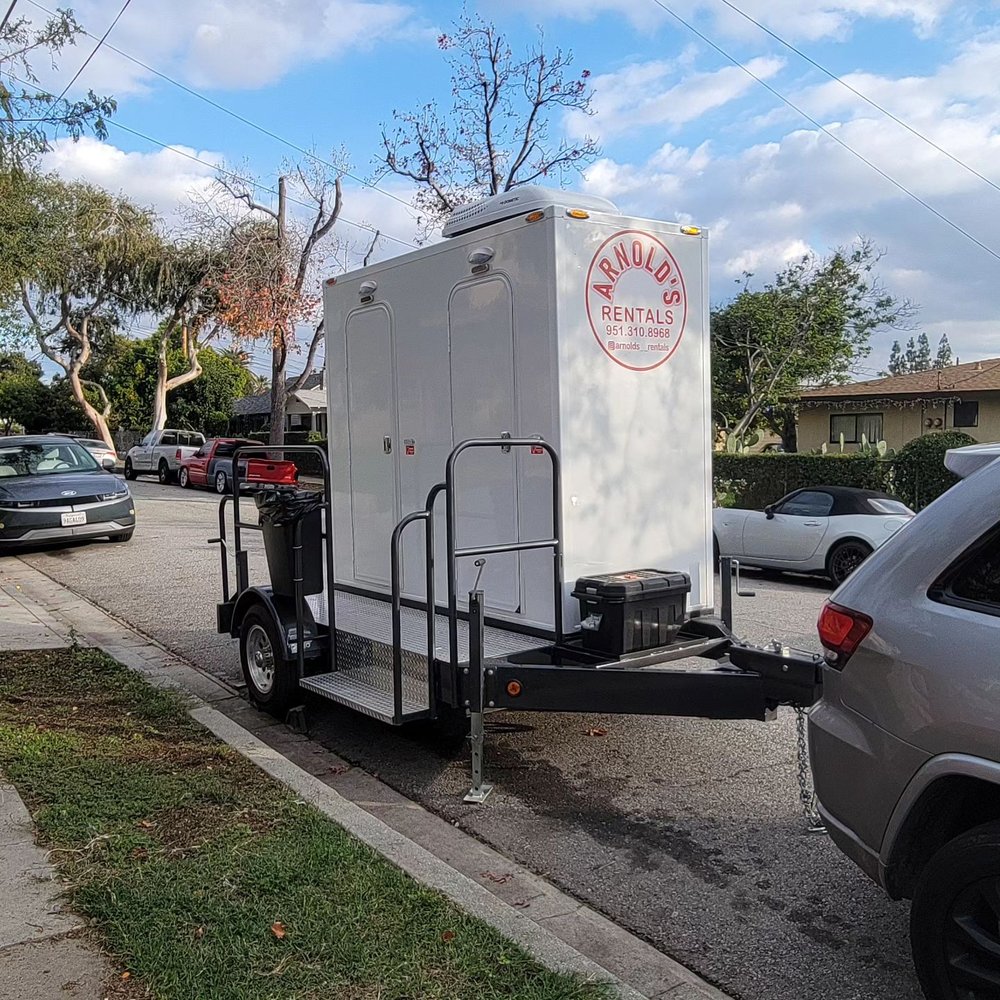 Arnolds Rentals - 2 restrooms delivered right to our party , has sink and AC as well - Portable Toilet Services Near Me