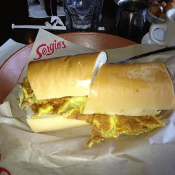 Sergio's Restaurant - Pan con tortilla breakfast sandwich. - Cuban Near Me - Miami, Florida Sergio's Restaurant - Pan con tortilla breakfast sandwich. - Cuban Near Me - Miami, Florida