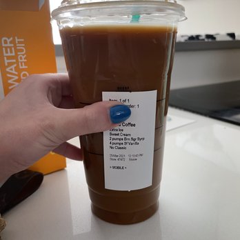 Starbucks - a hand holding a cup of coffee - Coffee & Tea Near Me - Westlake, Ohio Starbucks - a hand holding a cup of coffee - Coffee & Tea Near Me - Westlake, Ohio