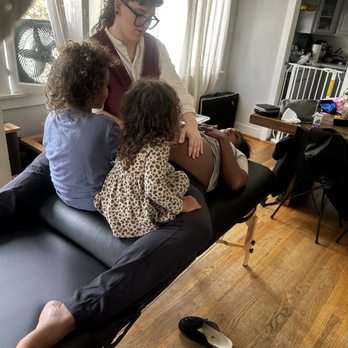 Long Beach Midwife - Prenatal Visits checking baby's position. Ray explaining & including my kids making them my big helpers. - Midwives Near Me Long Beach Midwife - Prenatal Visits checking baby's position. Ray explaining & including my kids making them my big helpers. - Midwives Near Me