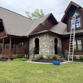 Haywood Window Cleaning - Cleaning high second-story windows safely and thoroughly to keep this home looking its best. - Window Washing Near Me - Canton, North Carolina