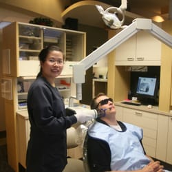 The Mill Creek Dentist - Giang our dental assistant taking a digital xray