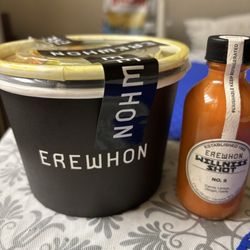 Erewhon - 4/9/26. When your Sweet Husband surprises you with chicken soup + elixir. Delicious and overpriced. As anticipated lol.