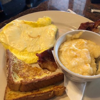 White Wolf Cafe - French Toast "scrambled eggs with cheese" and cheesy grits - New American Near Me - Orlando, Florida White Wolf Cafe - French Toast "scrambled eggs with cheese" and cheesy grits - New American Near Me - Orlando, Florida