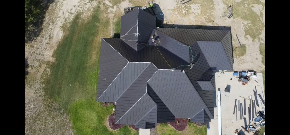 Slide of Metal Master Roofing