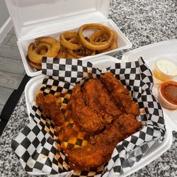 Hot Chicks Wings House - Order of 5 chicken strips. Whoops, yep they were soo good i ate one before I took a photo! Beyond delish!!!