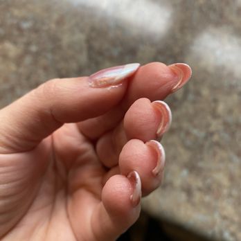 Nail Craft - Bubbles all over the uneven manicure, paint on my fingers, nails not attached to the applied tips, chipped, glue chunks under my thumb - Nail Salons Near Me - Milwaukee, Wisconsin