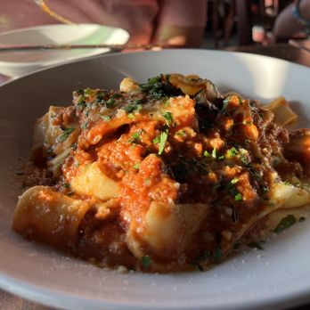 Rinata - a plate of pasta with meat and vegetables - Italian Near Me - Minneapolis, Minnesota