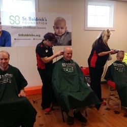 The Goddard School of Highlands Ranch - Sam Morton getting his head shaved for Saint Baldrick s cancer research.