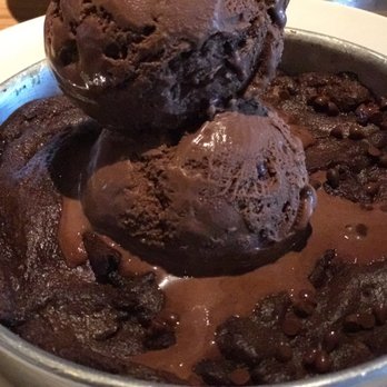 BJ's Restaurant & Brewhouse - Triple chocolate pizookie so so so good - New American Near Me - Valley Stream, New York