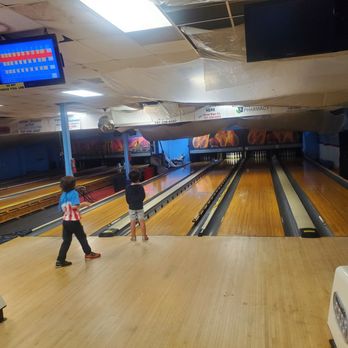 Libertino Lanes - Bowling with Child #1 and Child #2 - Bowling Near Me - Chincoteague, Virginia Libertino Lanes - Bowling with Child #1 and Child #2 - Bowling Near Me - Chincoteague, Virginia