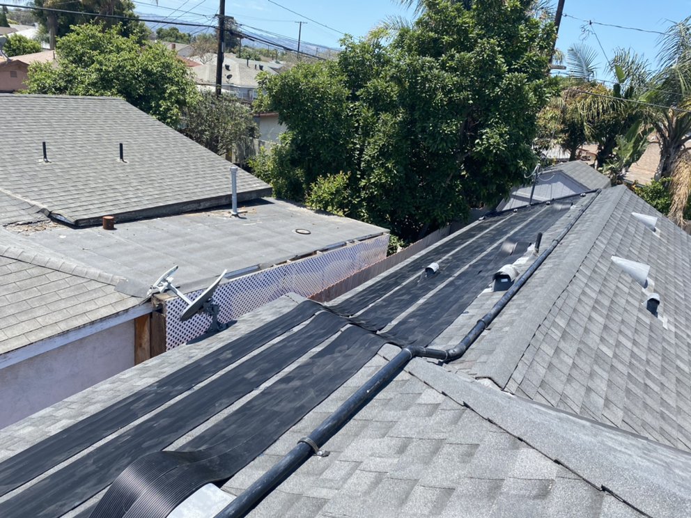 Slide of Pool Solar and Roofing
