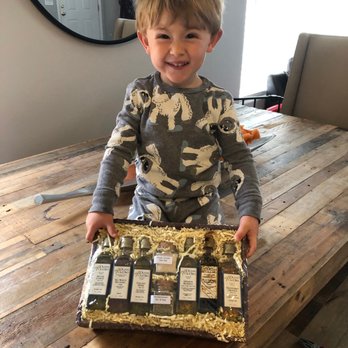 Olivas de Oro - Mother's Day basket being shown off by my grandson! - Olive Oil Near Me - Paso Robles, California Olivas de Oro - Mother's Day basket being shown off by my grandson! - Olive Oil Near Me - Paso Robles, California