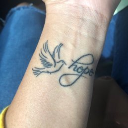 LOVE MY NEW TATTOO! Very clean, friendly service, and I walked away with EXACTLY what I wanted!!