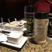 Photo of The Melting Pot - Jenks, OK, United States. Yummy sauces and spices to add on