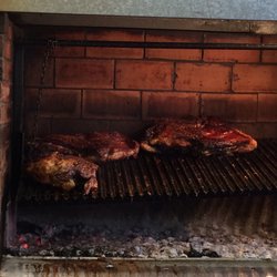 Los Amigos De Juan Parilla - The right grill with large chunks of beef that they call vacio - part of the flank muscle group, some say it is called a Bavette in the US.