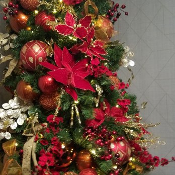 Dream Dance Steakhouse - Seated at table next to Holiday tree. - Steakhouses Near Me - Milwaukee, Wisconsin