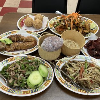 Hot-N-Spicy - Larb siin, thum mak hoong, sai oua, siin savanh, lard nar, sticky rice, and sesame balls. - Laotian Near Me - Madison, Wisconsin