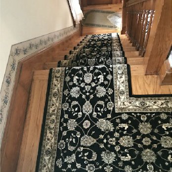 Carpet Guys USA - a black and white rug on a wooden staircase - Carpeting Near Me - New Windsor, New York Carpet Guys USA - a black and white rug on a wooden staircase - Carpeting Near Me - New Windsor, New York