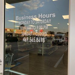Fossil Creek Liquor - Front door and hours