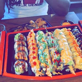 Bash Original Izakaya - Dragon Roll Bash  Platter C Salmon on the Beach Roll Godzilla Roll Lions Roll - Sushi Bars Near Me - Detroit, Michigan