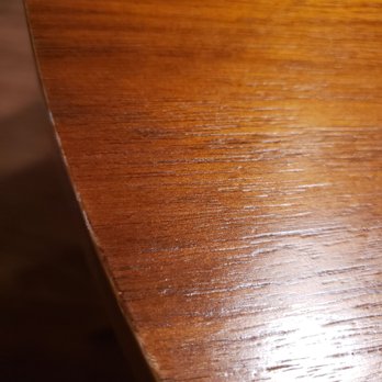 AK Movers - One of several scrapes along the edge of dining table - Movers Near Me - Rockville, Maryland