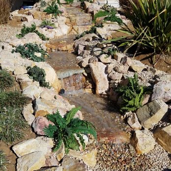Ponderiffic Adventures - a stream running through a garden - Landscaping Near Me - Indian Wells, California Ponderiffic Adventures - a stream running through a garden - Landscaping Near Me - Indian Wells, California