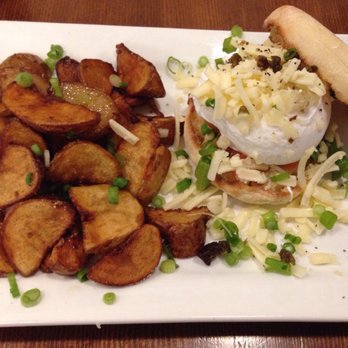 Yolks - Smoked salmon eggs benny with English muffin and a side of hash browns - Coffee & Tea Near Me - Vancouver, British Columbia