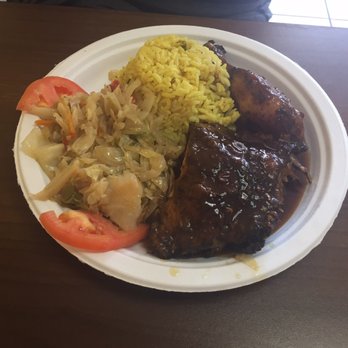 Mo'Bay Island Cuisine - Jerk Chicken with curry rice and steamed cabbage - Caribbean Near Me - Pooler, Georgia