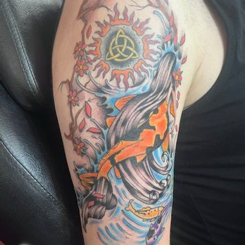 Idle Hands Tattoo Parlour - Sun tattoo with celtic knot was the orignal redone tattoo. Flex designed the bordering mermaid and cherry blossom tattoo. - Tattoo Near Me - New Orleans, Louisiana Idle Hands Tattoo Parlour - Sun tattoo with celtic knot was the orignal redone tattoo. Flex designed the bordering mermaid and cherry blossom tattoo. - Tattoo Near Me - New Orleans, Louisiana