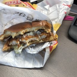Thin dry old chicken.  This the new Hand Breaded Sandwich, looks worse than the 99cent one