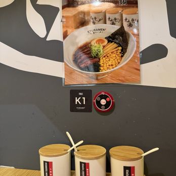 Kyuramen x TBaar- UCF - Spices on the table - Ramen Near Me - Orlando, Florida