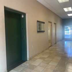 NewportCare Medical Group - Lobby on first floor where elevator is located in the middle of the building.  It was so odd.