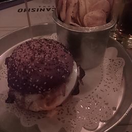 Burger with egg and freshly made chips Burger with egg and freshly made chips