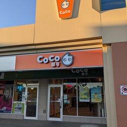 Storefront. There's a green sign behind the signature orange one.