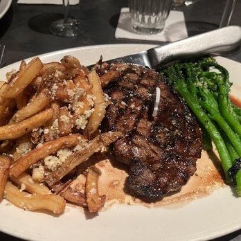 Chris McD's - Ribeye with truffle fries, broccolini - Steakhouses Near Me - Columbia, Missouri