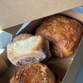 Tommy and Atticus - From Left to Right - Kouign Amann, Morning Bun, and Croissant. - Bakeries Near Me - Redondo Beach, California Tommy and Atticus - From Left to Right - Kouign Amann, Morning Bun, and Croissant. - Bakeries Near Me - Redondo Beach, California