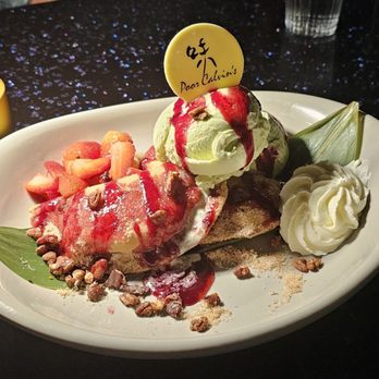 Poor Calvin's - Peach apple empanadas with homemade pistachio ice cream. - Asian Fusion Near Me - Atlanta, Georgia