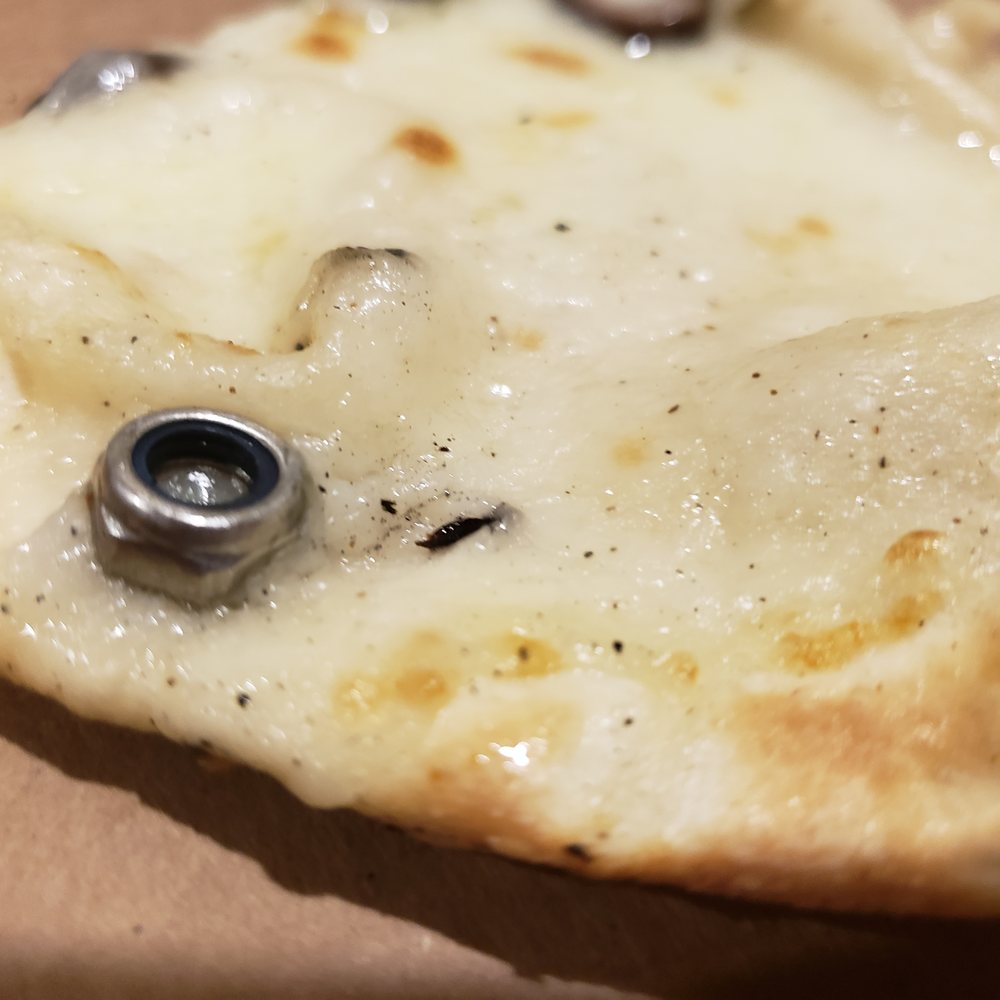 A metal BOLT was in my son's pizza! A metal BOLT was in my son's pizza!